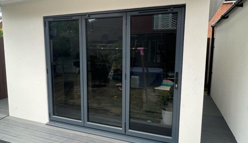 Aluminium bifold door with tinted glass